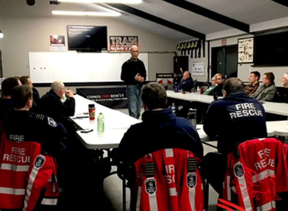 A JTF instructor delivering emergency preparedness training to a Vancouver Island fire rescue crew